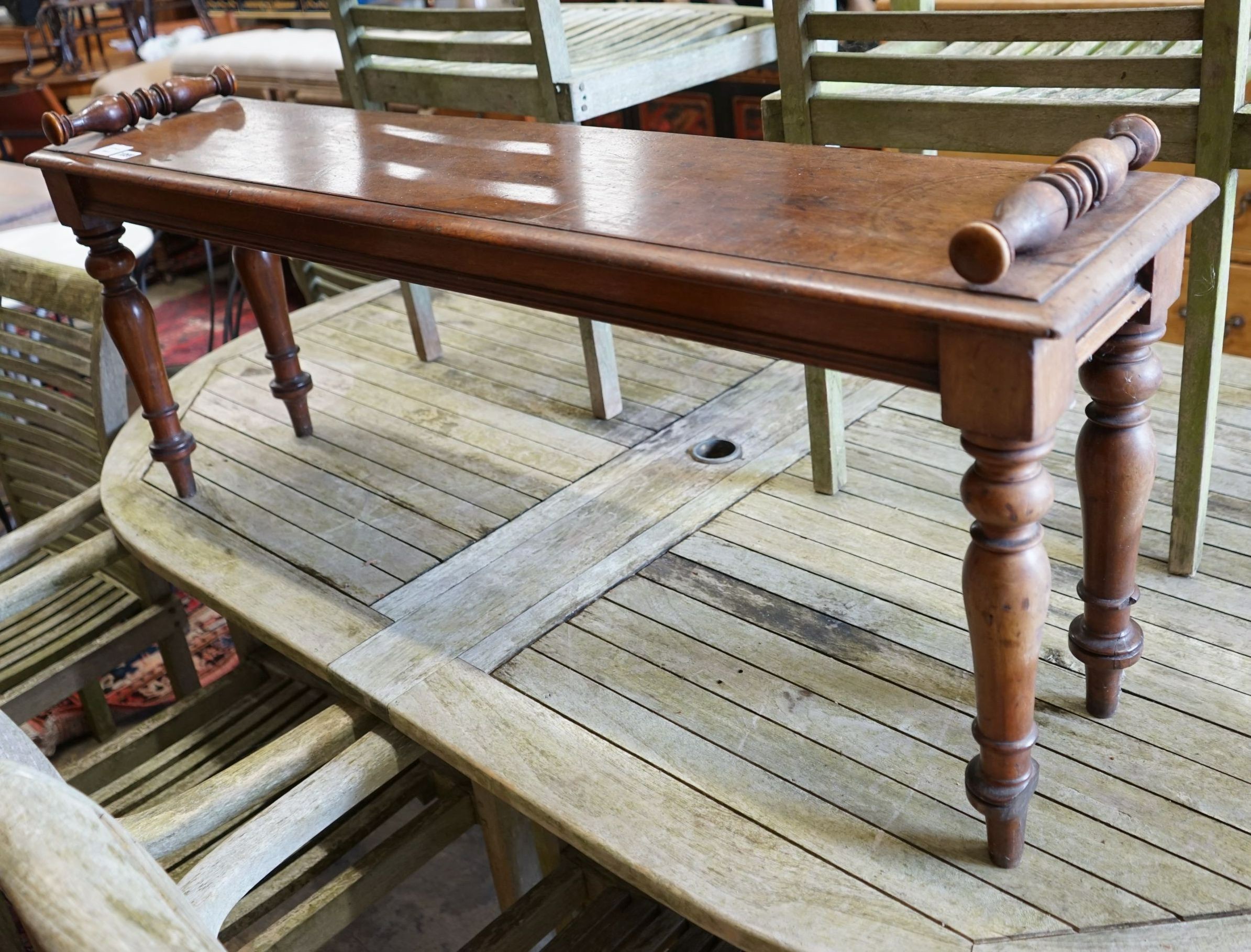 A Victorian mahogany window seat, length 122cm, depth 28cm, height 50cm
